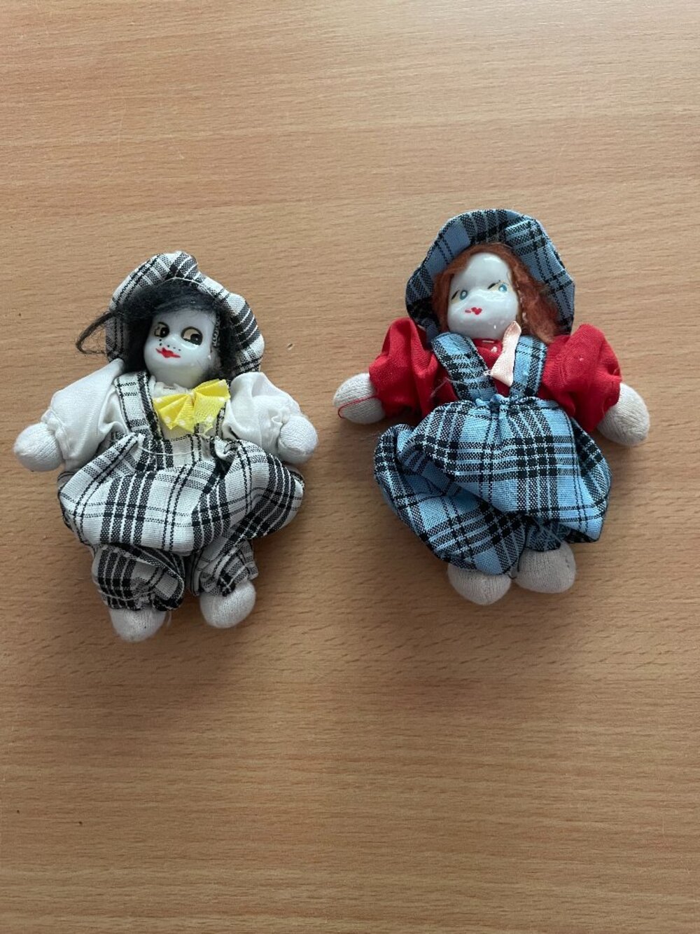 Two vintage miniature dolls porcelain head painted face fabric bodies clown